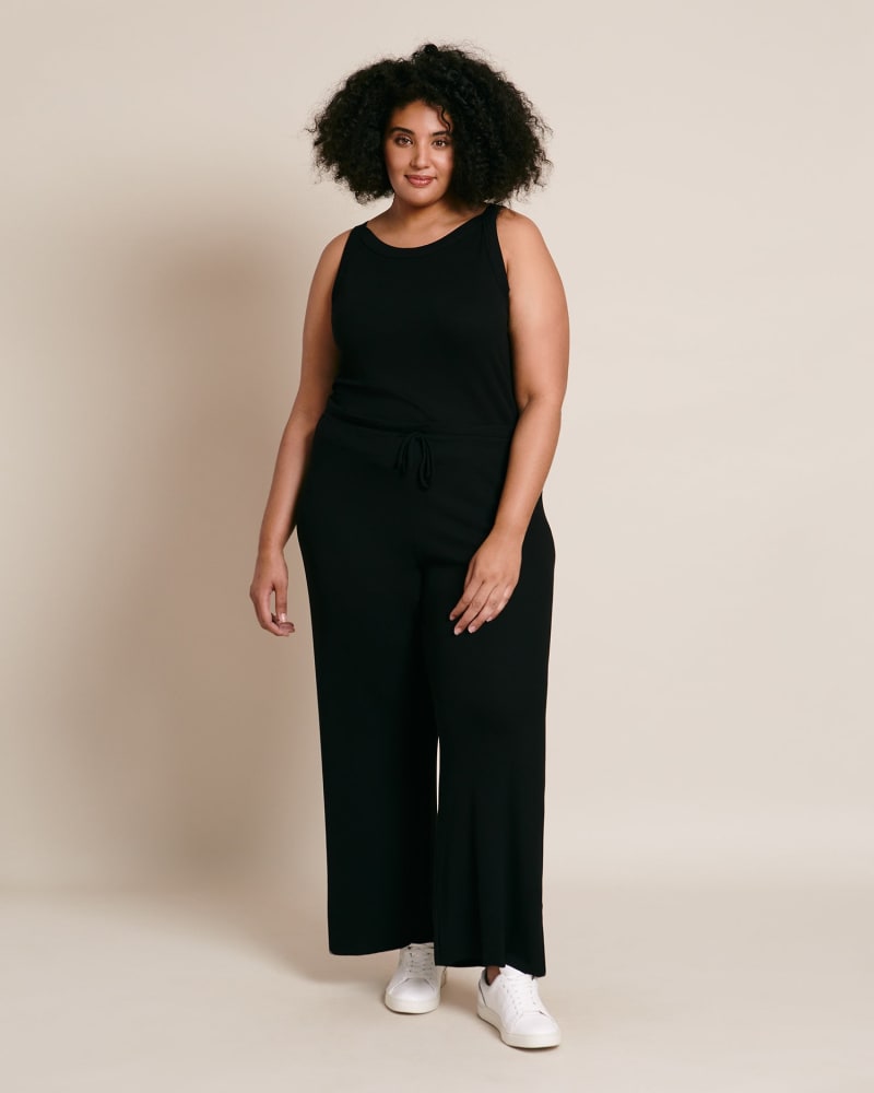 Front of a model wearing a size 2X Core Ribbed Kismet Pant in Black by LNA. | dia_product_style_image_id:225630